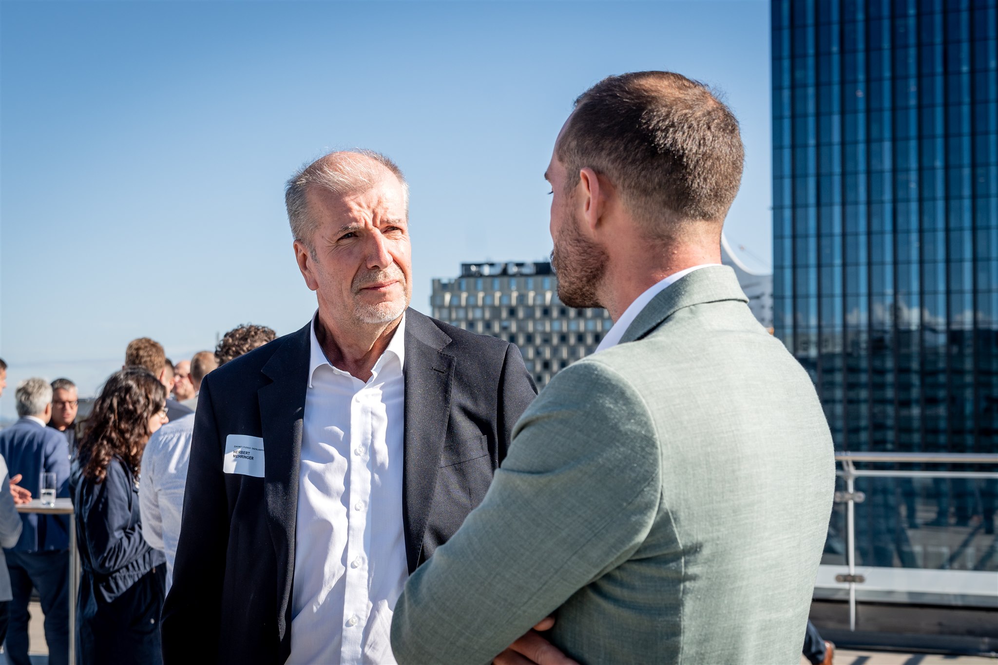 ÖFK Branchentreff 2024 Gespräch zwischen Teilnehmenden beim ÖFK-Branchentreff